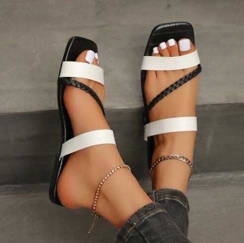 Woven Flat Slippers Crossover SandalsDobaDealsexpress.shopWoven Flat Slippers Crossover SandalsDetails
Square Toe Design: Square open toe design has always been a trend element of sandals, these design will make you more fashionable.
Non Slip Outsoles: The ru