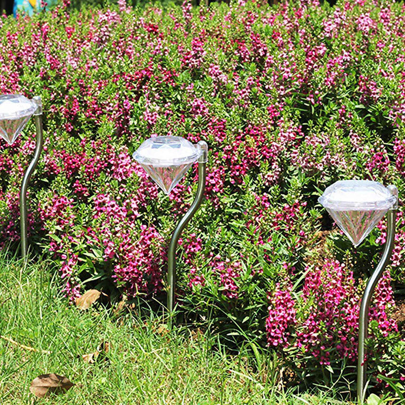 4Pcs Solar Garden Light Outdoor Diamond LED Light IP65 Waterproof StakDobaDealsexpress.shop4Pcs Solar Garden Light Outdoor Diamond LED Light IP65 Waterproof Stake Decorative LampHighlights
7-Color auto changing
17% High photoelectric conversion
IP65
Details
*Features*:
**EXQUISITE DIAMOND SOLAR GARDEN LIGHTS*:Come with 4 pack of diamond sola