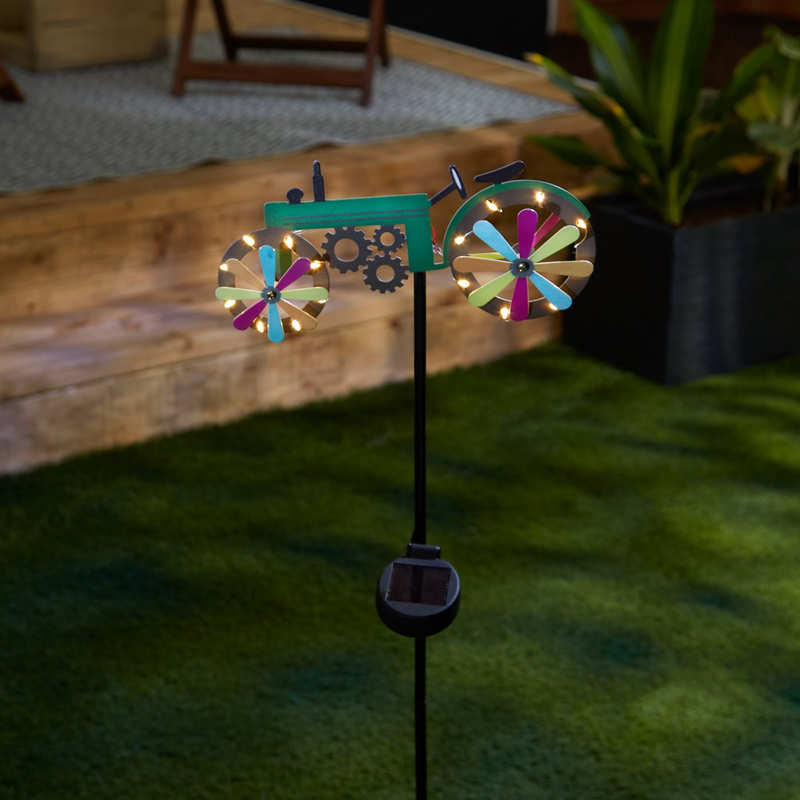 Tractor Solar Lighted Garden StakeDealsexpress.shopDealsexpress.shopTractor Solar Lighted Garden StakeCheerful green farm tractor is a country-style garden stake during the day and lights up at night. The solar panels collect the sun's energy, and the little lights a