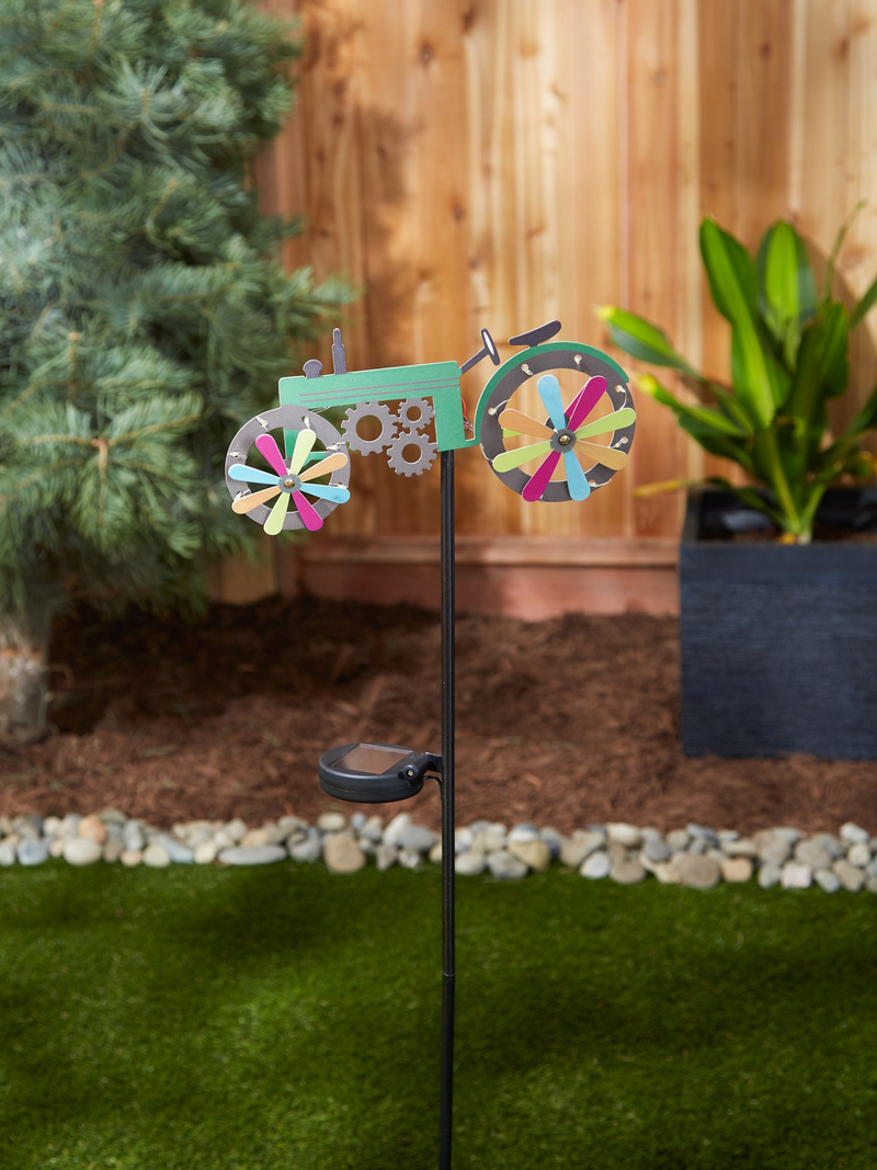 Tractor Solar Lighted Garden StakeDealsexpress.shopDealsexpress.shopTractor Solar Lighted Garden StakeCheerful green farm tractor is a country-style garden stake during the day and lights up at night. The solar panels collect the sun's energy, and the little lights a