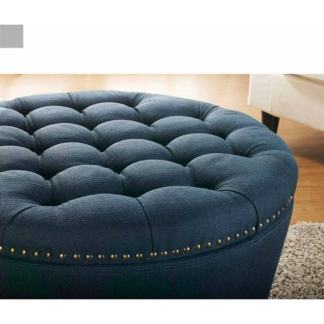 Round Tufted Storage Ottoman with NailheadsDobaDealsexpress.shopRound Tufted Storage OttomanHighlights
Features a tapered base, a chic tufted top in linen upholstery and nail head detailing
Top is generously padded for comfortable seating
Top is easily remo