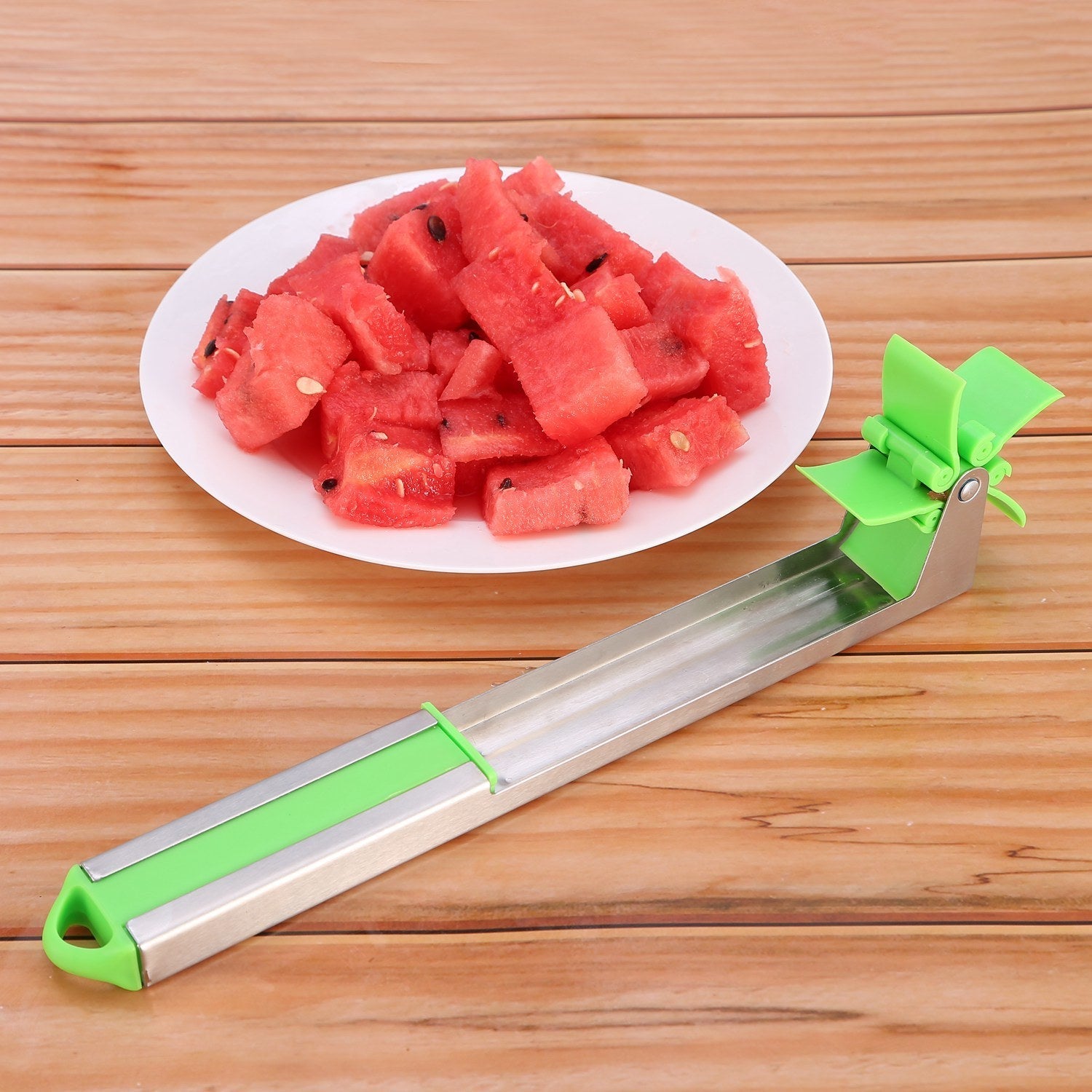 Watermelon Slicer Stainless Steel Watermelon Cubes Windmill Cutter MelDobaDealsexpress.shopWatermelon Slicer Stainless Steel Watermelon Cubes Windmill Cutter Melon Knife Fruit Tools Kitchen GadgetsHighlights
Eat and cut watermelon in an quicker and easier way
Make your own watermelon salad in one minute, enjoy refreshing watermelon cubes in Summer.
Food-grade 